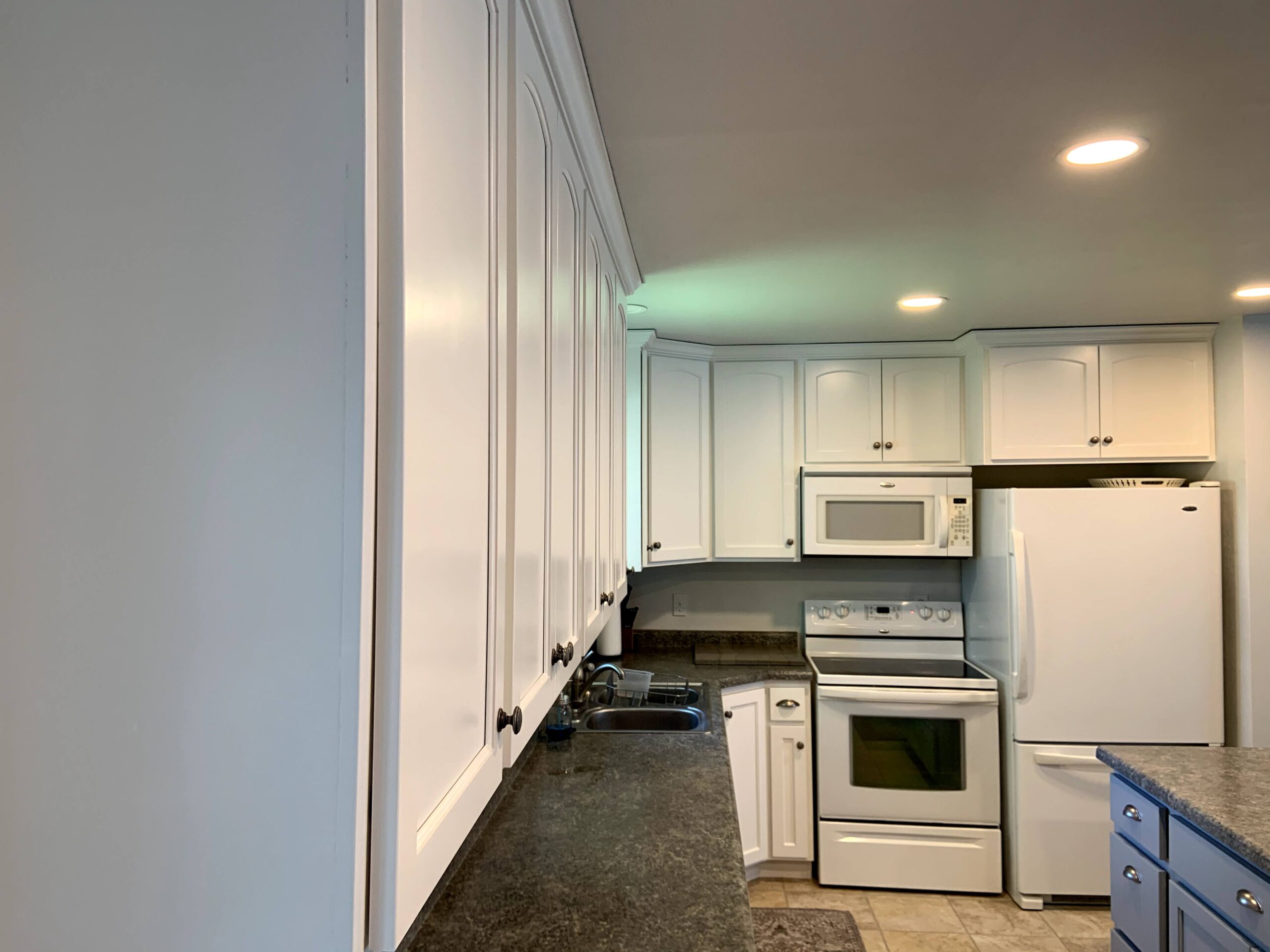 Refinished kitchen cabinetry in Colorado Springs, Colorado home